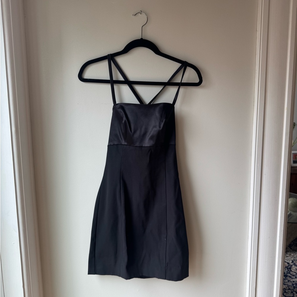 Elegant Black Strappy Mini Dress with Cross-Back